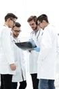 Group of radiologists discussing x-ray Royalty Free Stock Photo