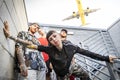 Group of rappers posing on the metal stairs