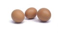 Group of raw brown chicken eggs , yellow egg photographed from the front Royalty Free Stock Photo