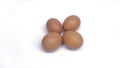Group of raw brown chicken eggs , yellow egg photographed from the front Royalty Free Stock Photo