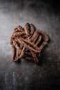Group of raw smoked sausages on cutting board Royalty Free Stock Photo