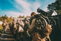 Group Of Re-enactors Dressed As Soviet Russian Red Army Infantry Soldiers Of World War II Marching Walking Along Country