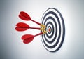 Group of red darts hitting a dartbord Royalty Free Stock Photo