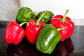 Group Of Red,Green Peppers Just Washed On Chopping Board Royalty Free Stock Photo