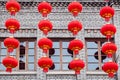 Group of red lanterns hanging on the black bricks wall in the Chinese new year,Fuzhou,Fujian,China Royalty Free Stock Photo