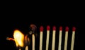 Group of red match burning isolated on black background Royalty Free Stock Photo