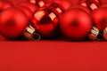 Group of red matt and glossy christmas balls on red background Royalty Free Stock Photo