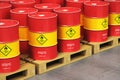 Group of red oil drums on shipping pallets in the storage warehouse Royalty Free Stock Photo