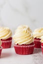 Group of red velvet cupcakes on white background