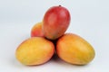 Group of red and yellow mangoes