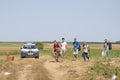 Group of refugees, from passing in front of a Croatian police car while crossing the Serbia Croatia border in Tovarnik Sid