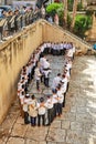 A group of religious people celebrate Simchat Torah. Sing songs and hold Torah scrolls