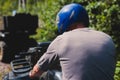 Group of riders riding ATV vehicle crossing forest rural road, process of driving rental vehicle, all terrain quad bike vehicle, Royalty Free Stock Photo