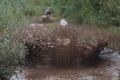 Group of riders riding atv vehicle on off road track, process of driving ATV vehicle, all terrain quad bike vehicle, during Royalty Free Stock Photo