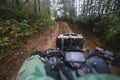Group of riders riding atv vehicle on off road track, process of driving ATV vehicle, all terrain quad bike vehicle, during Royalty Free Stock Photo
