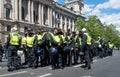 Group of riot police on standby in Whitehall, London, UK.