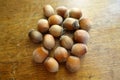 Group of ripe hazelnuts on table Royalty Free Stock Photo