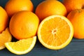 Group of ripe oranges on wooden table Royalty Free Stock Photo