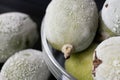 Group of ripe raw green feijoas in bowl. Frozen Royalty Free Stock Photo