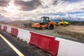 Group of road rollers repairing a section of a road Royalty Free Stock Photo