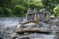 Rock Pile on a Log by a River in Toronto Royalty Free Stock Photo