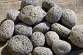 Group of round lava stones, small nature lava rocks background