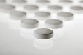 Group of round tablets on white Royalty Free Stock Photo