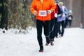 group runners athletes run winter trail marathon Royalty Free Stock Photo