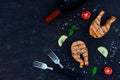 Group salmon steaks pepper salt top view on dark background space