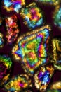 Group of sand grains in a polarization micrograph.