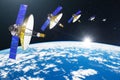 Group of satellites with dish antennas in orbit around the Earth, for communication and monitoring systems. Elements of this image