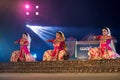 Group of Sattriya Dancers performing Sattriya Dance on stage at Konark Temple, Odisha, India.An assamese classical indian dance. Royalty Free Stock Photo