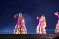 Group of Sattriya Dancers performing Sattriya Dance on stage at Konark Temple, Odisha, India.An assamese classical indian dance. Royalty Free Stock Photo