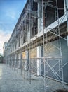 A group of scaffolding on the side of a building. Royalty Free Stock Photo
