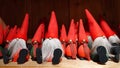 Group of Scandinavian Nisse or Cristmas Goblins with red conical cap Royalty Free Stock Photo