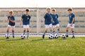 Group of School Boys Kicking Soccer Balls Royalty Free Stock Photo