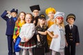 Group of school children dressing up as professions. Future education. Royalty Free Stock Photo