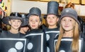 Group of school children wearing costumes for maskenball