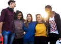 Group of school friends outdoors arms around one another togetherness and community concept Royalty Free Stock Photo