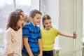 Group of school kids taking selfie with smartphone Royalty Free Stock Photo