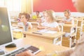 Group of school pupils raise their hands up Royalty Free Stock Photo