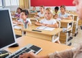 Group of school pupils raise their hands up Royalty Free Stock Photo