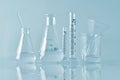 Group of scientific laboratory glassware with clear liquid solution, Research and development. Royalty Free Stock Photo