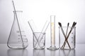 Group of scientific laboratory glassware with clear liquid solution Royalty Free Stock Photo