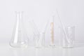 Group of scientific laboratory glassware with clear liquid solution Royalty Free Stock Photo