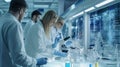 Group of Scientists Conducting Experiments in Laboratory Royalty Free Stock Photo