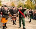 A group of Scottish drummers have fun after the parade