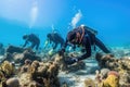 A group of scubas swim gracefully together over a beautiful and colorful coral reef, Team of marine scientists conducting a coral Royalty Free Stock Photo
