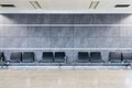 A group of seats in a clean nice decorated waiting hall at terminal, airport, mall or a hospital. Royalty Free Stock Photo