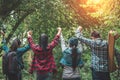 Group of senior adults trekking in the forest